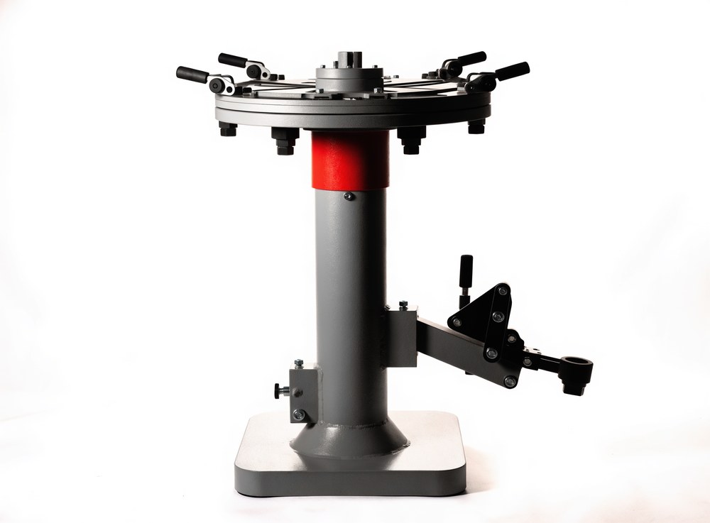 Automotive tire changer machine on a white background at Steel Bay Automotive Supply